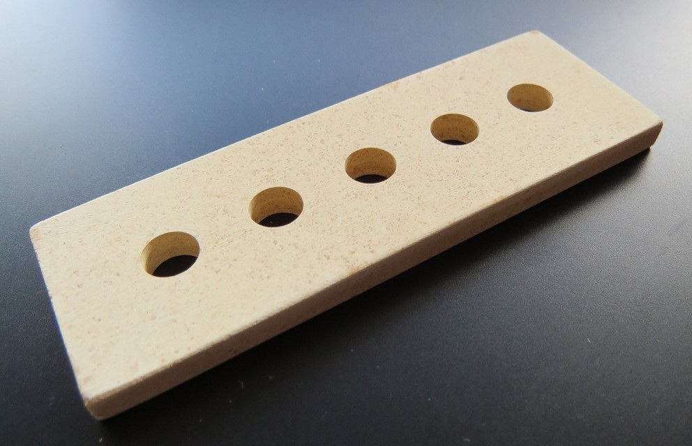 Image of a bone plate, rectangular with five holes